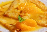Classic Crêpes Suzette Recipe: Flaming Orange Butter Crepes