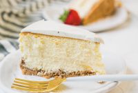 Creamy Vanilla Cheesecake with Tangy Sour Cream Glaze