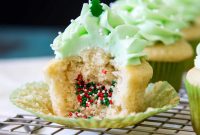 Christmas Piñata Cupcakes with Peppermint Frosting
