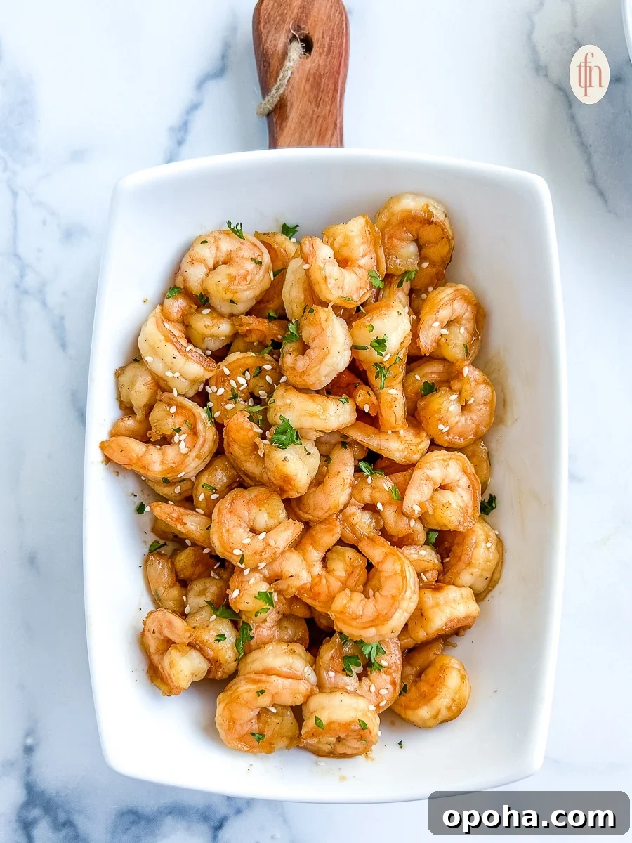 Quick Summer Dinner Recipes for Lazy Weeknights 4 Blackstone hibachi shrimp on a white platter.