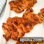 Quick Summer Dinner Recipes for Lazy Weeknights 6 Smoked chicken thighs on a platter.