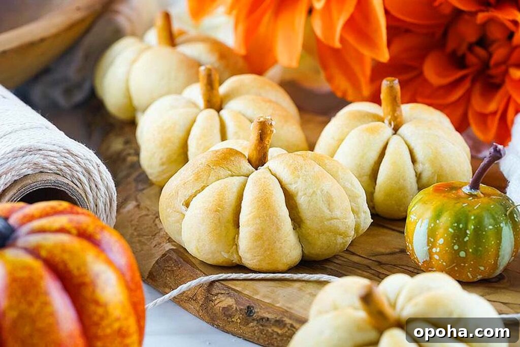 18 Spooky Halloween Movie Night Snacks to Delight Your Guests 8 Pumpkin shaped treats filled with cheese.