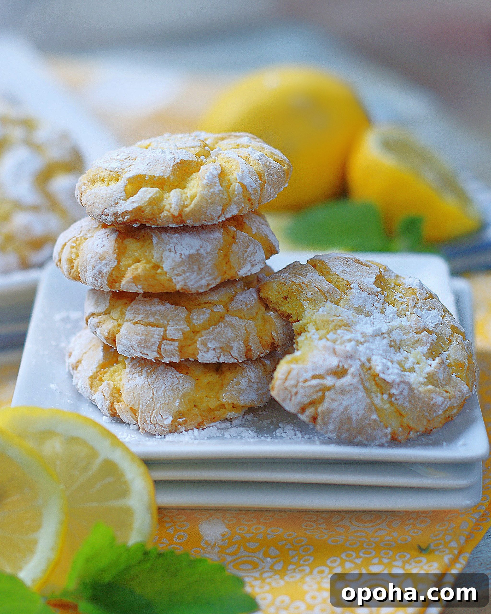 Zesty Lemon Crinkle Cookies Recipe for Bright, Chewy Cookies 6 Lemon Cookie stack with a bite.