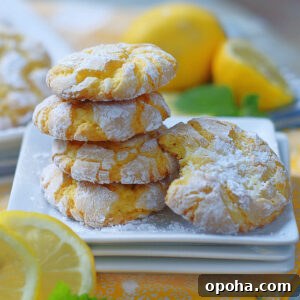 Zesty Lemon Crinkle Cookies Recipe for Bright, Chewy Cookies 7 Lemon Cookie stack with a bite.
