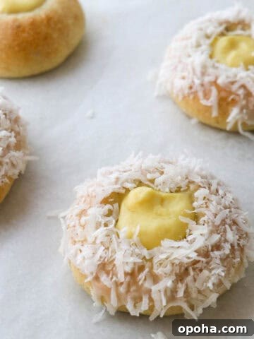 Norwegian Skoleboller on a baking sheet lined with parchment paper.