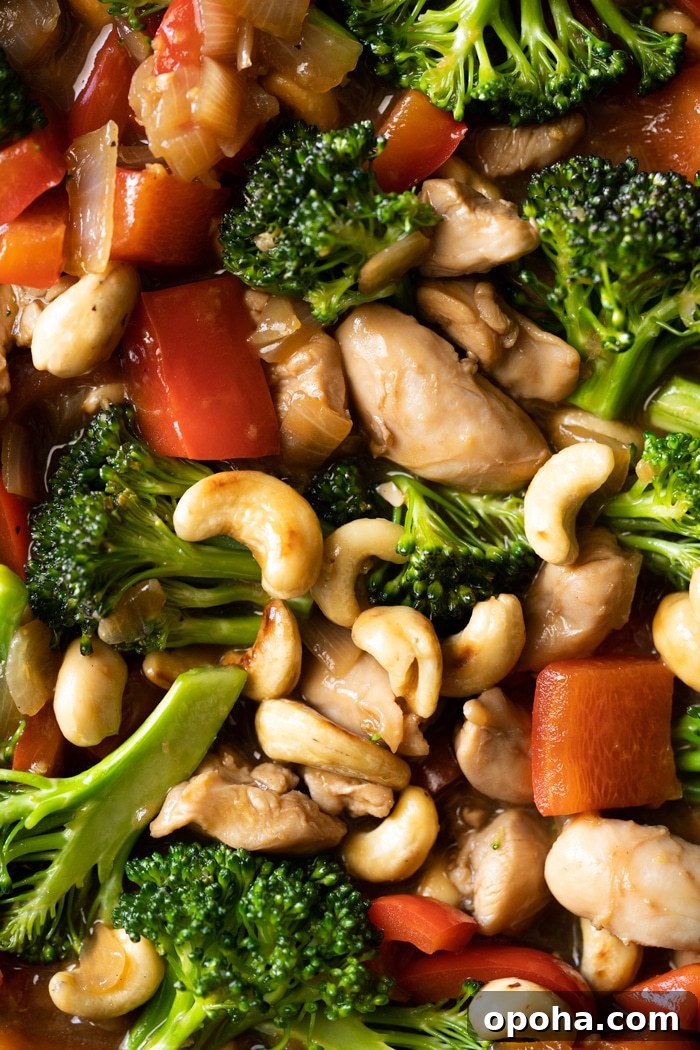 Keto & Paleo Cashew Chicken Recipe — Low-Carb Takeout Alternative 3 Closeup keto cashew chicken with red peppers and broccoli