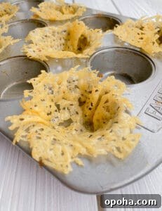 Mini Parmesan Caesar Salad Cups: Crispy Baked Appetizer 11 Baked parmesan into muffin tin.
