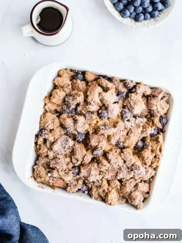 French toast casserole in a white baking dish.