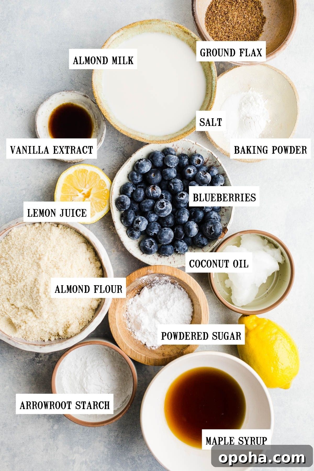 Ingredients to make scones in small separate bowls.