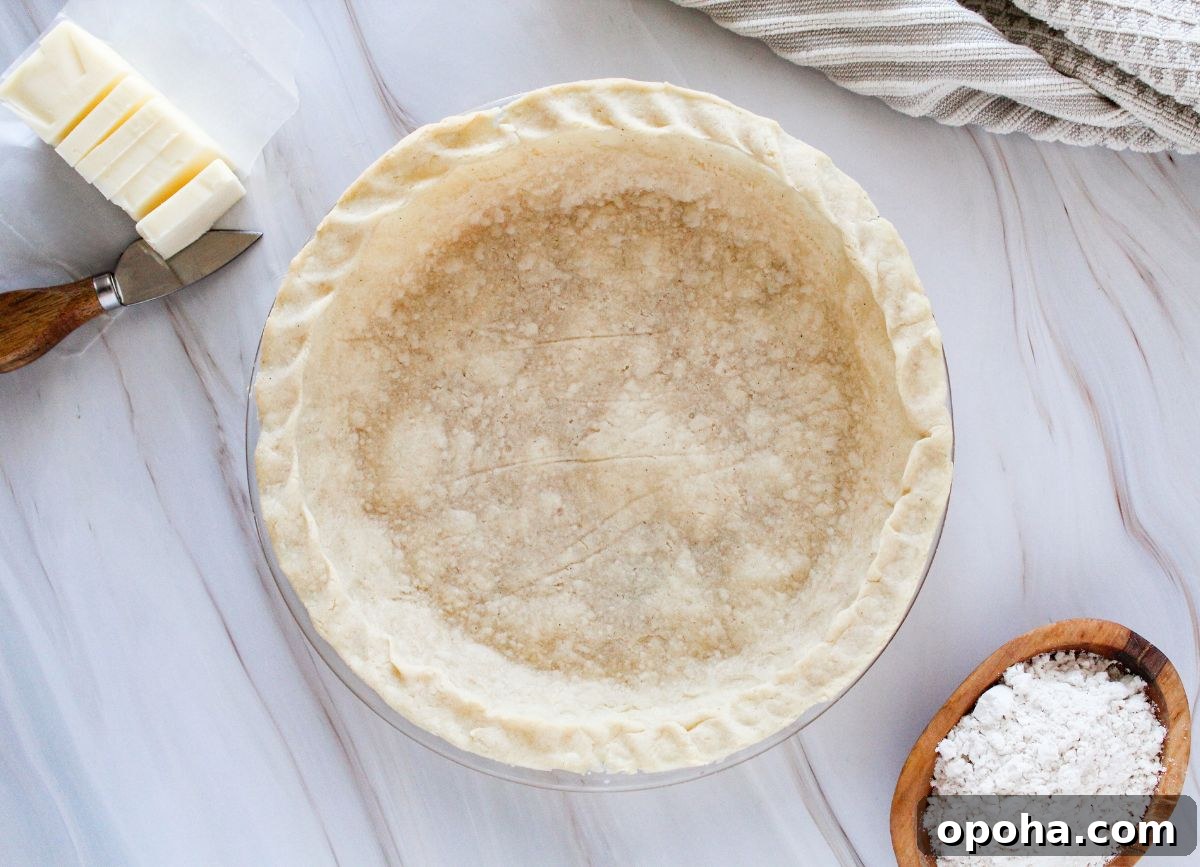 Flaky Gluten-Free Pie Crust Recipe (Dairy-Free) 2 Looking down on a pie crust made from gluten free ingredients.