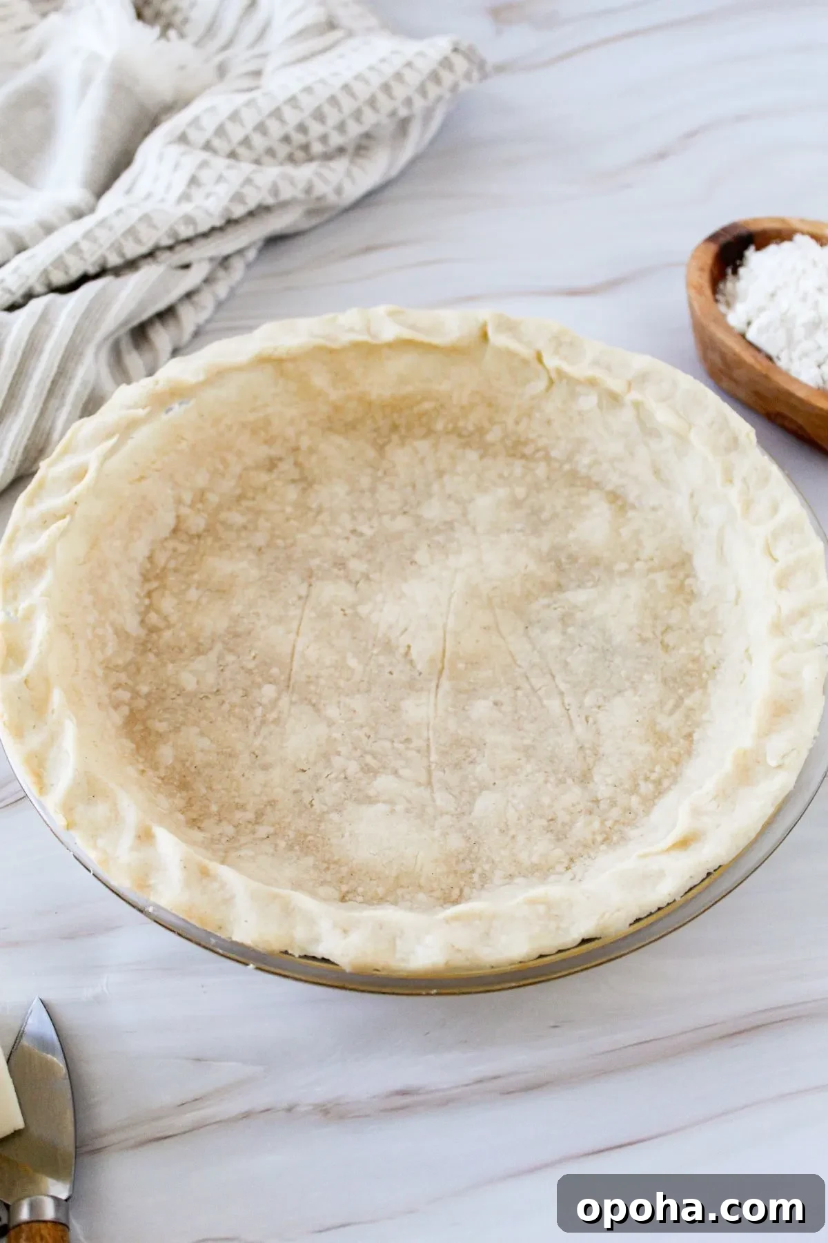 Flaky Gluten-Free Pie Crust Recipe (Dairy-Free) 10 Gluten free pie crust in a pie plate.