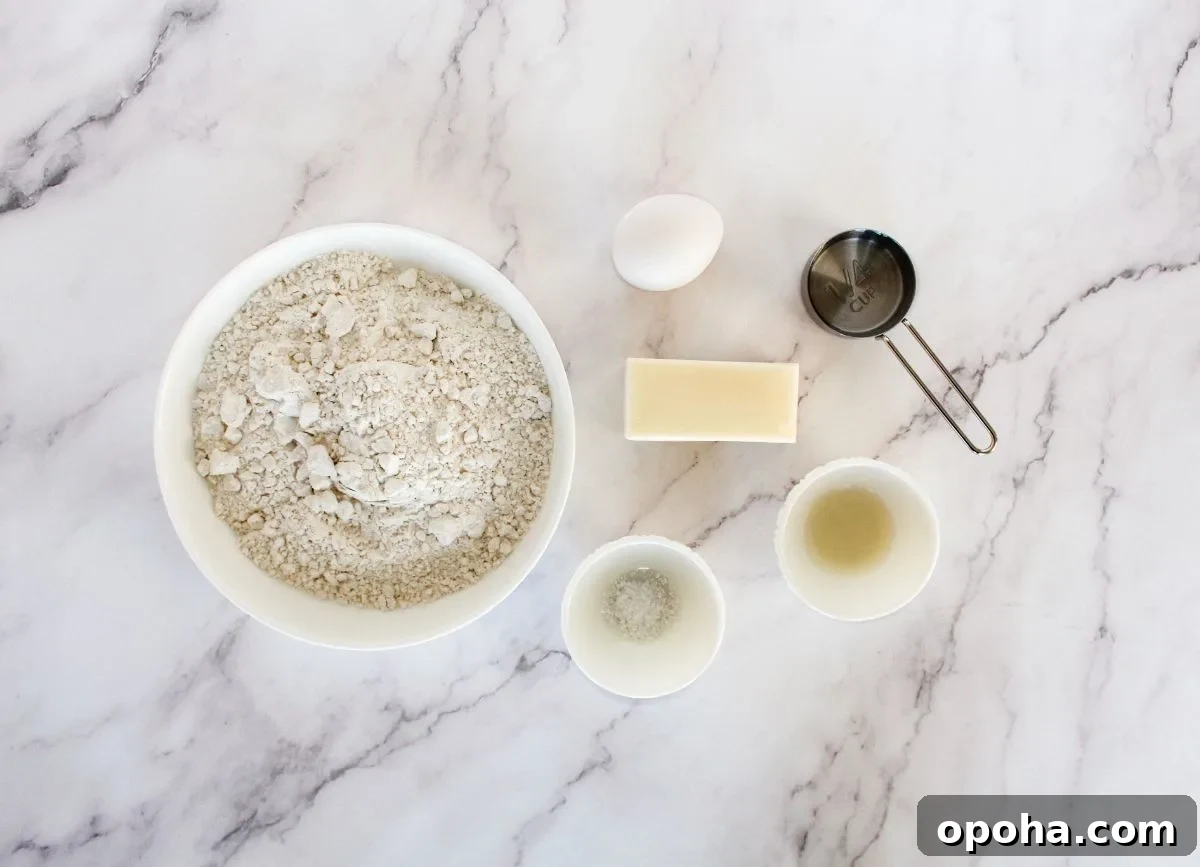 Flaky Gluten-Free Pie Crust Recipe (Dairy-Free) 3 Dairy free butter, glute free flour, egg, water, lemon juice, and salt.