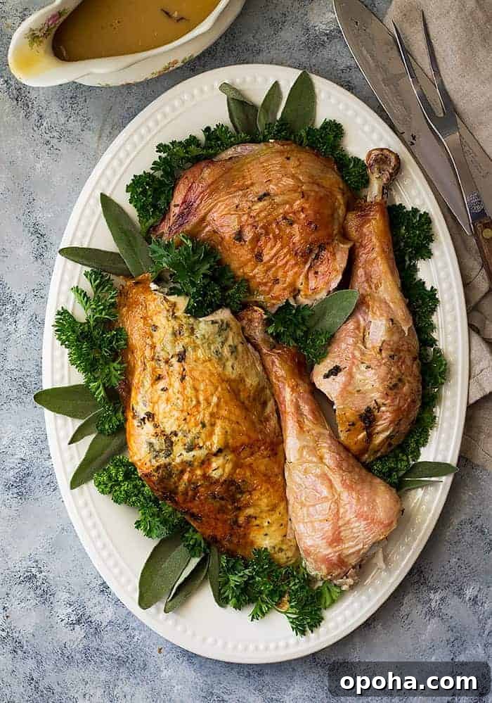 Herb-Roasted Spatchcock Turkey Recipe for Juicy, Crispy Skin 2 overhead: roasted spatchcock turkey on a white serving dish