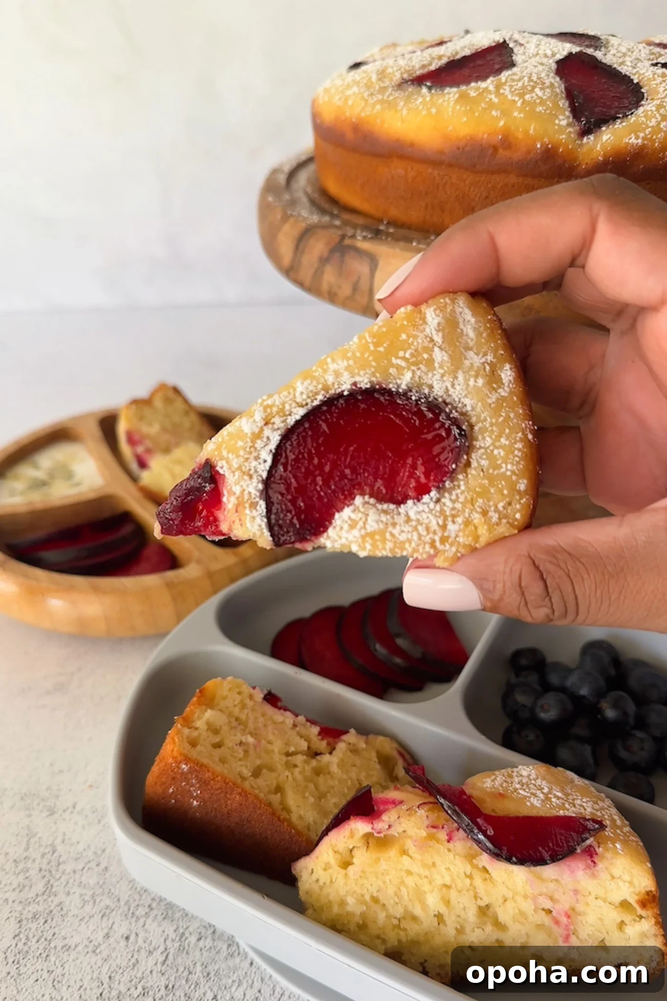 Moist Yogurt Plum Cake Recipe for Perfect Summer Baking 7 Yogurt plum cake served with fruits.