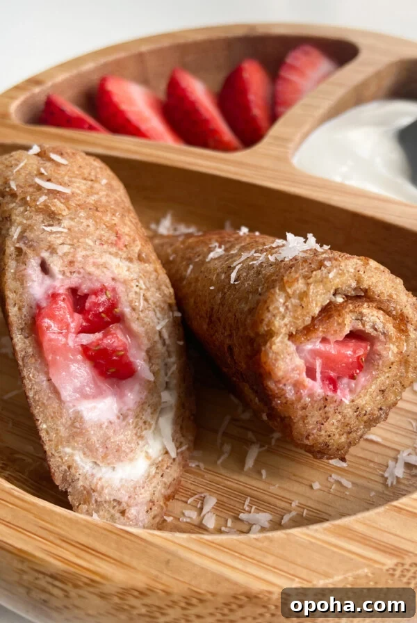 Moist Yogurt Plum Cake Recipe for Perfect Summer Baking 8 Strawberry cheesecake rollups served with sliced strawberries and yogurt