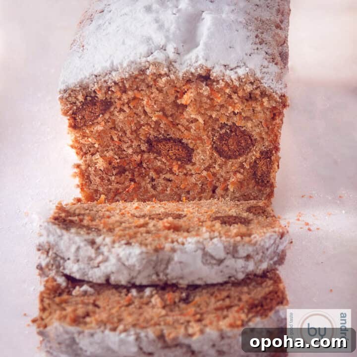 A square photo with a carrot cake filled with gingerbread nuts.