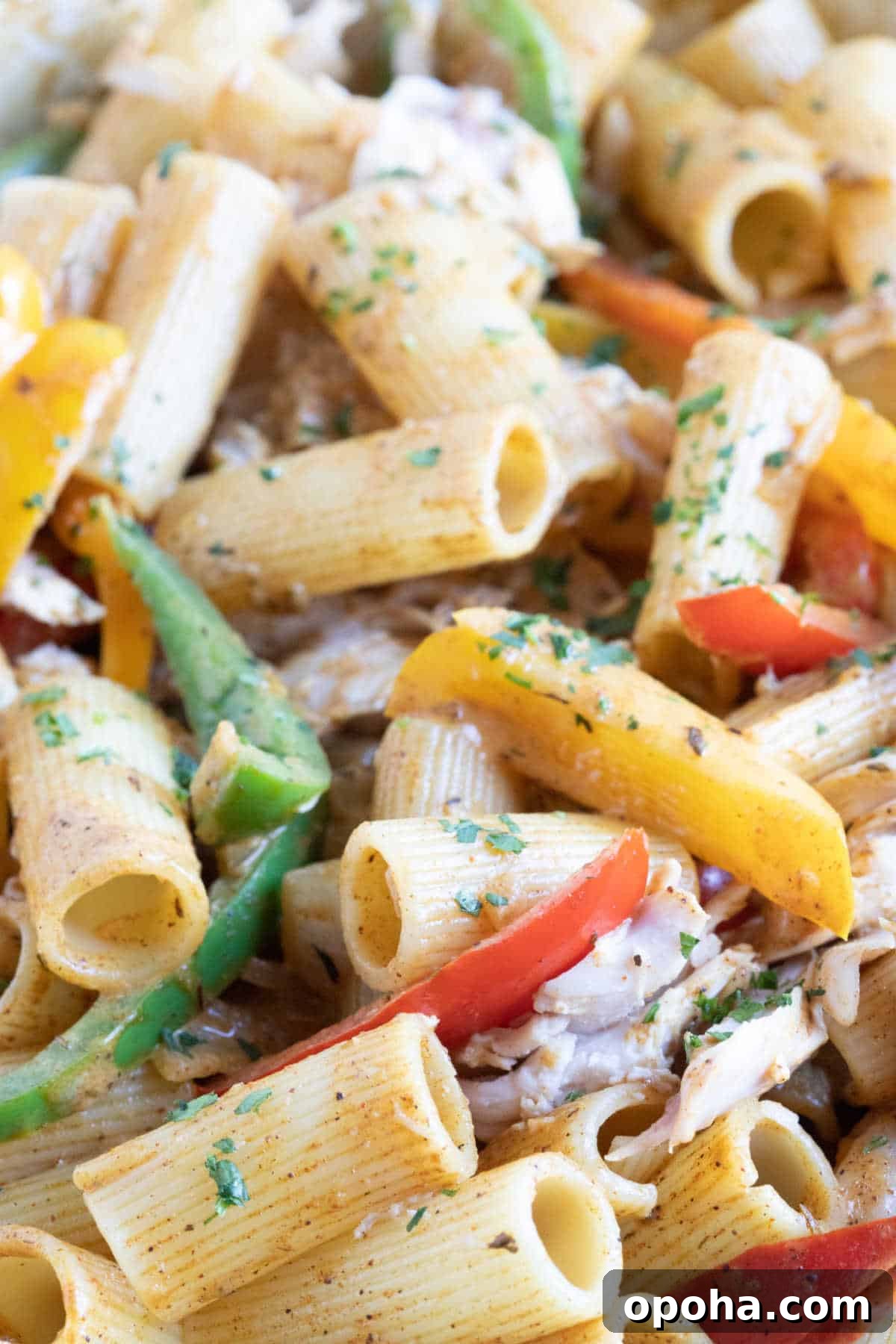 Creamy Rasta Pasta with Leftover Chicken — Quick Caribbean-Inspired Meal 5 A close up photograph of rasta pasta.
