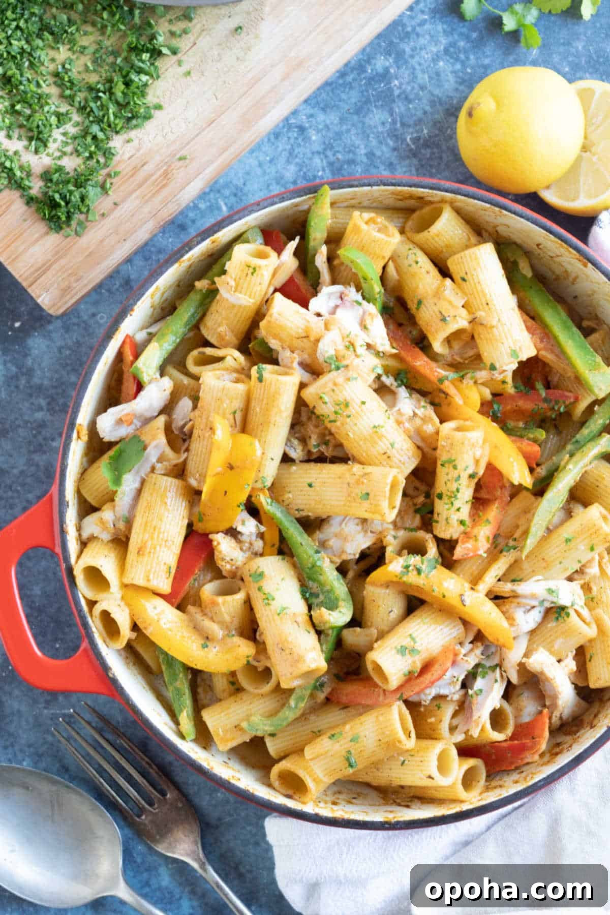 Creamy Rasta Pasta with Leftover Chicken — Quick Caribbean-Inspired Meal 6 Rasta pasta in a red pan with chicken.