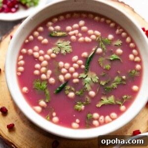 120+ Delicious Vegetarian Diwali Recipes to Try This Year 5 anar pani puri garnished with coriander leaves and boondi and served in a white bowl