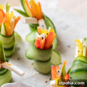120+ Delicious Vegetarian Diwali Recipes to Try This Year 10 cucumber rolls served on a white platter