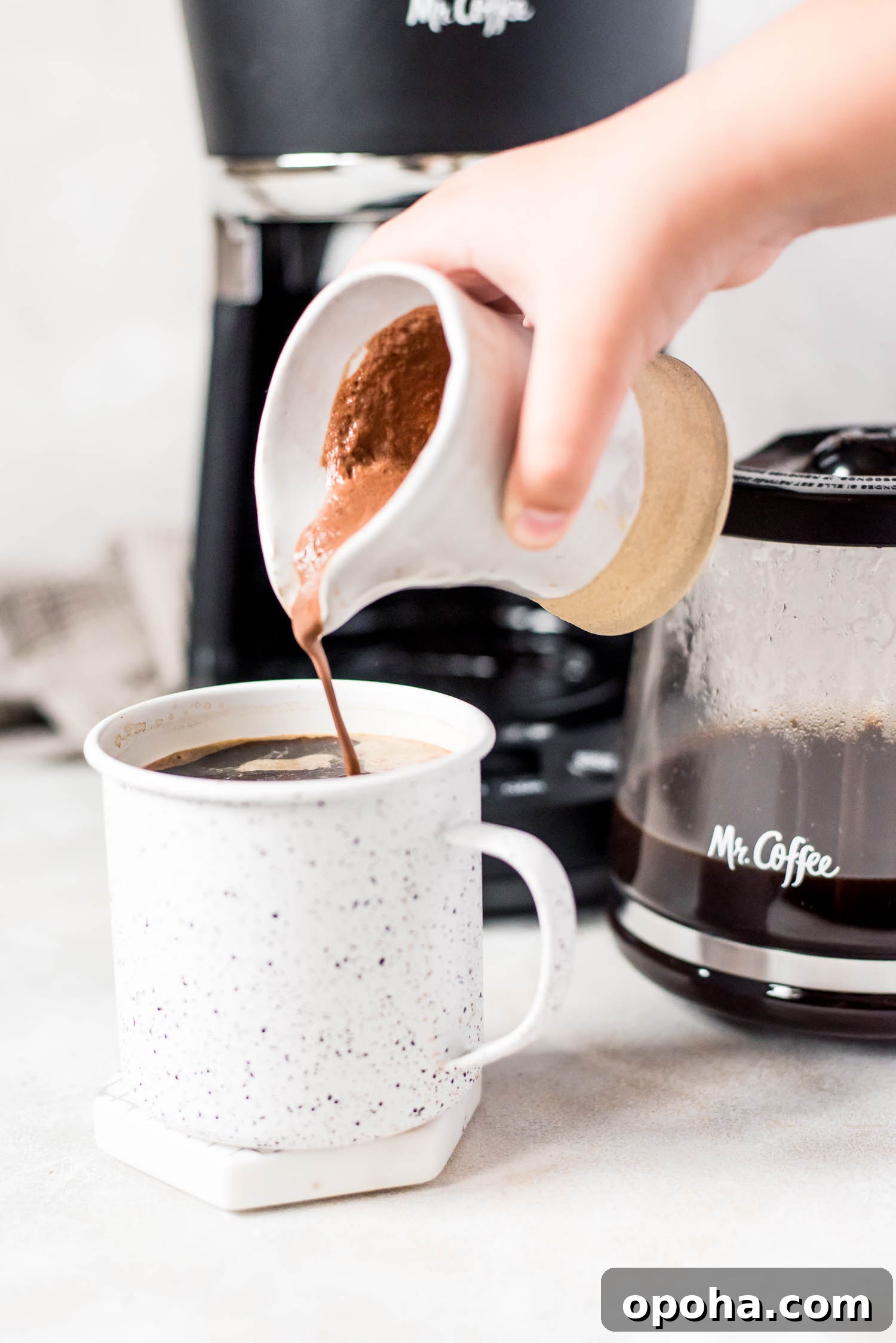 Rich Mocha Coffee Creamer Recipe for Smooth, Chocolatey Mornings 6 mocha coffee creamer poured into coffee mug