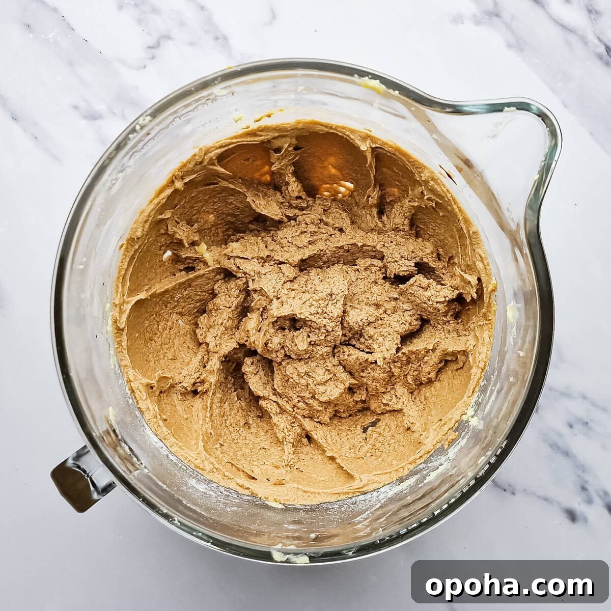 Decadent Coffee and Walnut Cake Recipe for Coffee Lovers 5 a glass bowl with creamed sugar, eggs and coffee mixture.