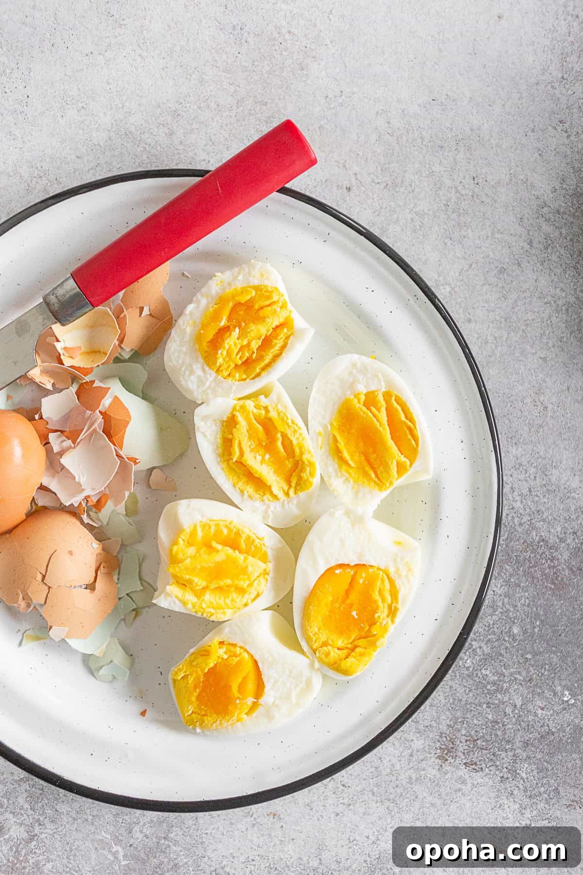 Instant Pot Hard Boiled Eggs peeled on a plate.