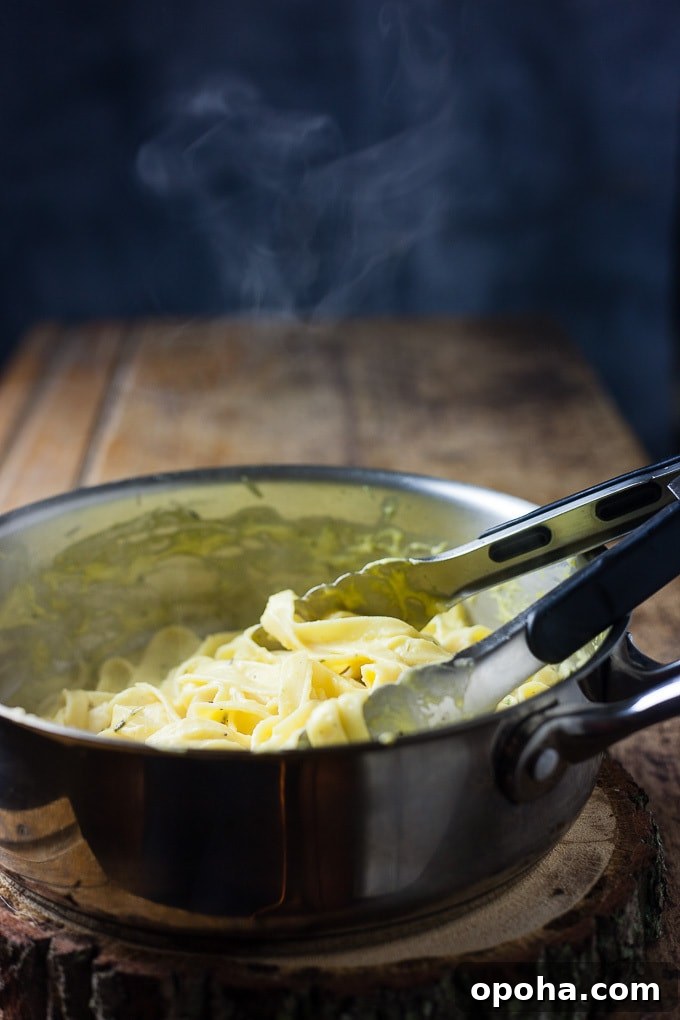 Creamy Pumpkin Alfredo Pasta Recipe for Fall Comfort 3 Pumpkin alfredo fettuccine with mushrooms.