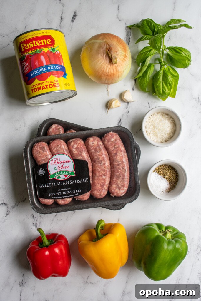 Slow Cooker Sausage and Peppers with Onions and Tomato Sauce 4 Ingredients for making crockpot sausage and peppers laid out on a tabletop.
