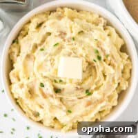 Creamy Mashed Potatoes with Sour Cream and Chives 14 mashed potatoes topped with butter