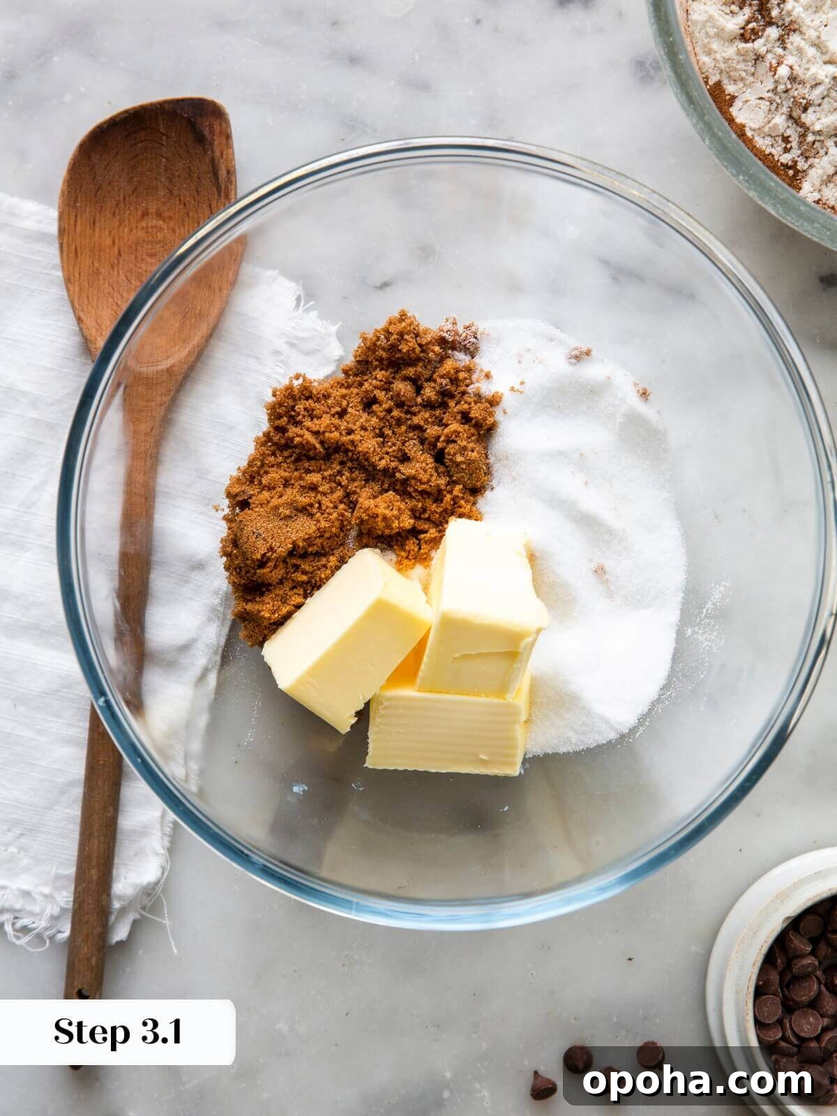 Pumpkin Chocolate Chip Cookie Recipe — Soft, Spiced & Gooey 6 A close-up of softened butter and sugars to be creamed together for the pumpkin chocolate chip cookie dough.