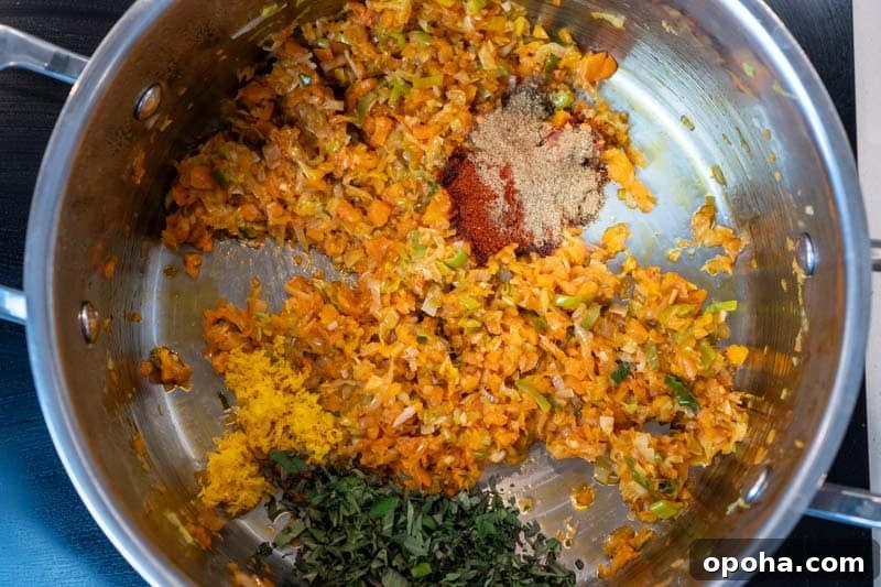 Adding the spices & herbs