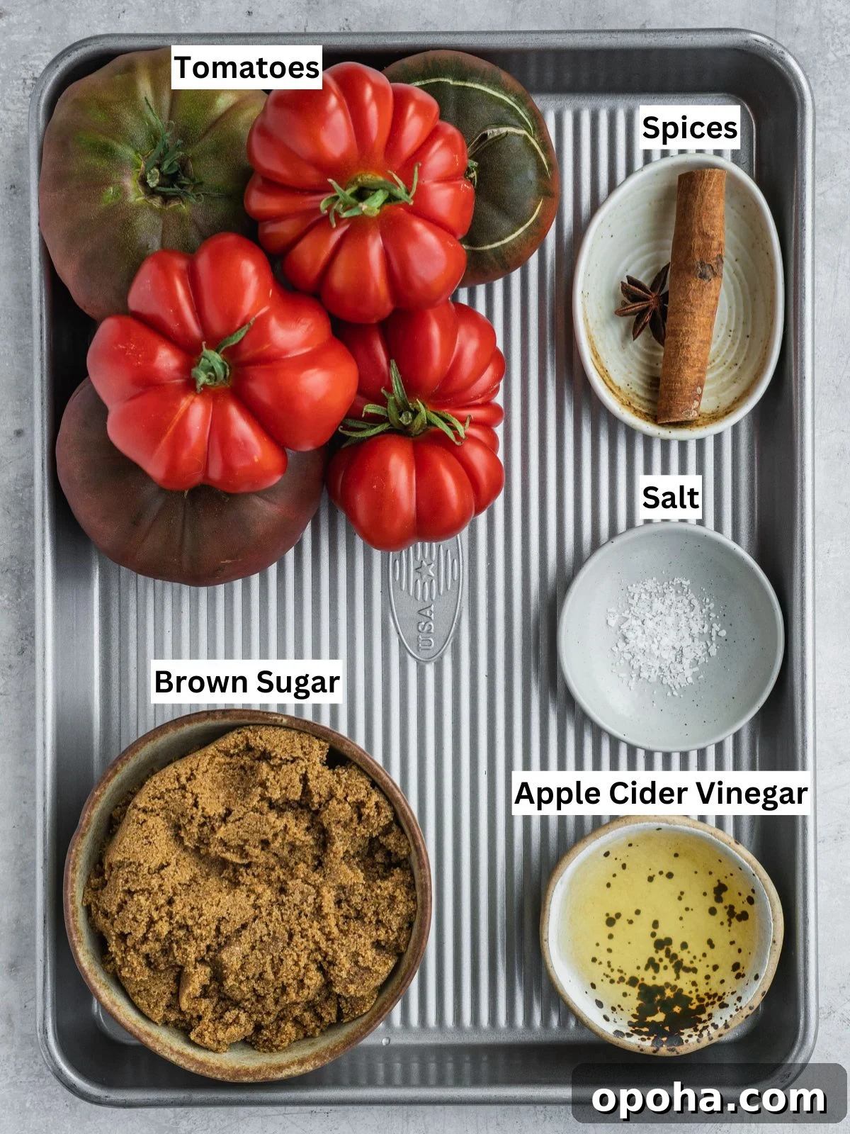 Tomato Jam recipe ingredients with individual labels on a metal tray.