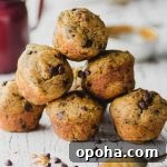 Close up view of 6 vegan peanut butter chocolate chip banana muffins piled