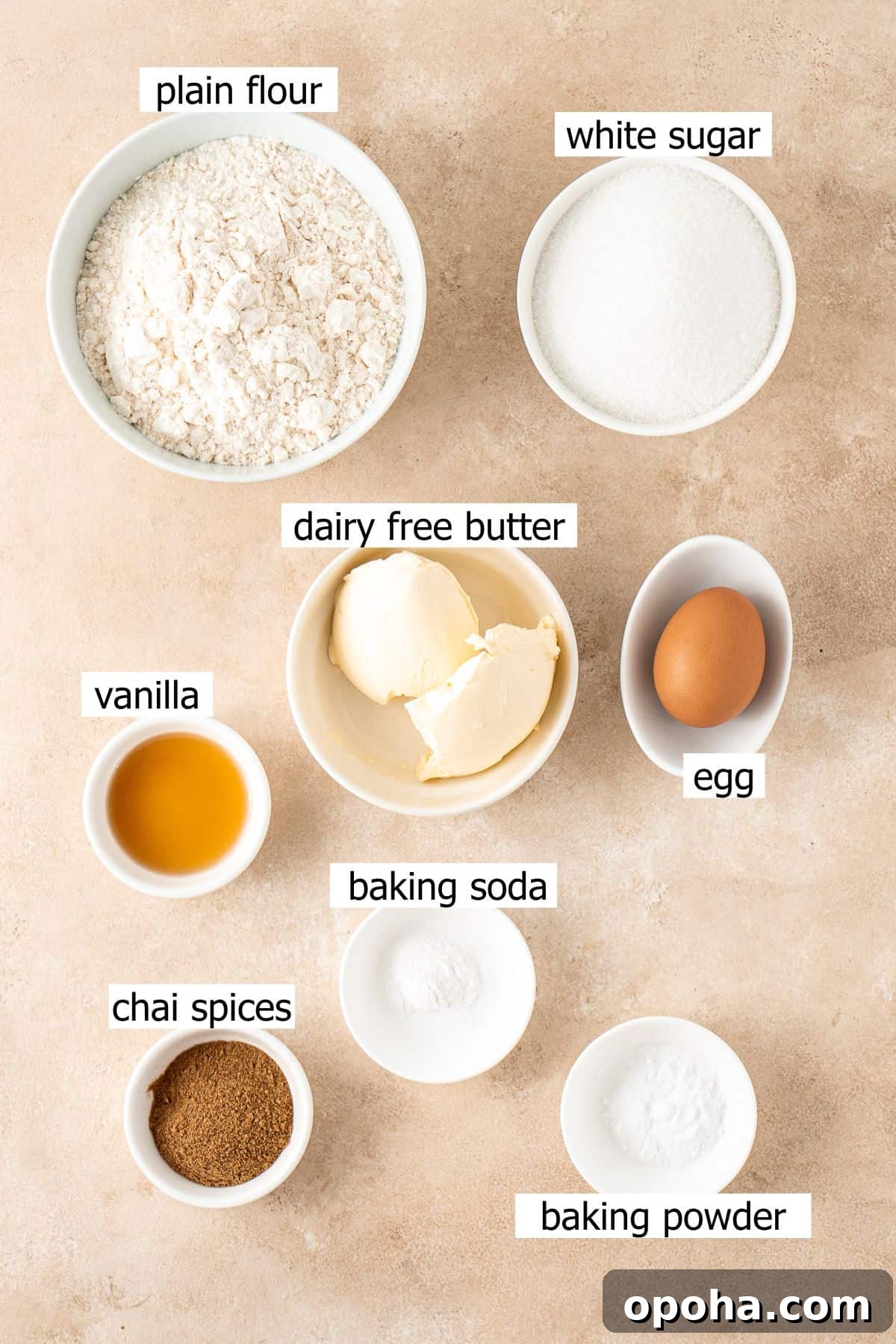 Chai-Spiced Sugar Cookies: Warm, Crispy Tea-Infused Treats 3 All ingredients needed to make chai sugar cookies laid out in small bowls.