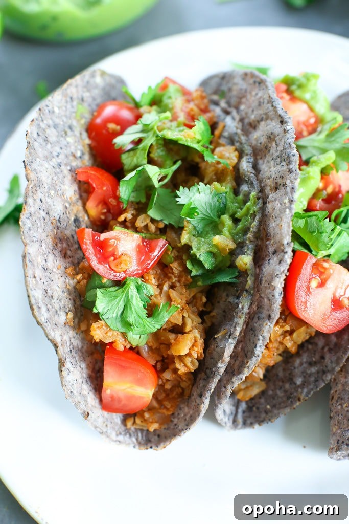 Crispy Cauliflower Tacos with Chipotle Lime Slaw 4 Cauliflower Tacos Recipe close up picture with hard shell