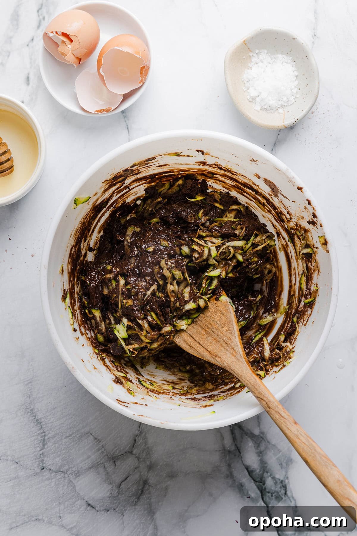 Fudgy Zucchini Brownies Recipe — Moist Chocolate Zucchini Squares 4 These Fudgy Zucchini Brownies are deliciously moist with a rich chocolate taste loaded with shredded zucchini and made healthier with zero butter or refined sugar! One of our family's favorite summer desserts!