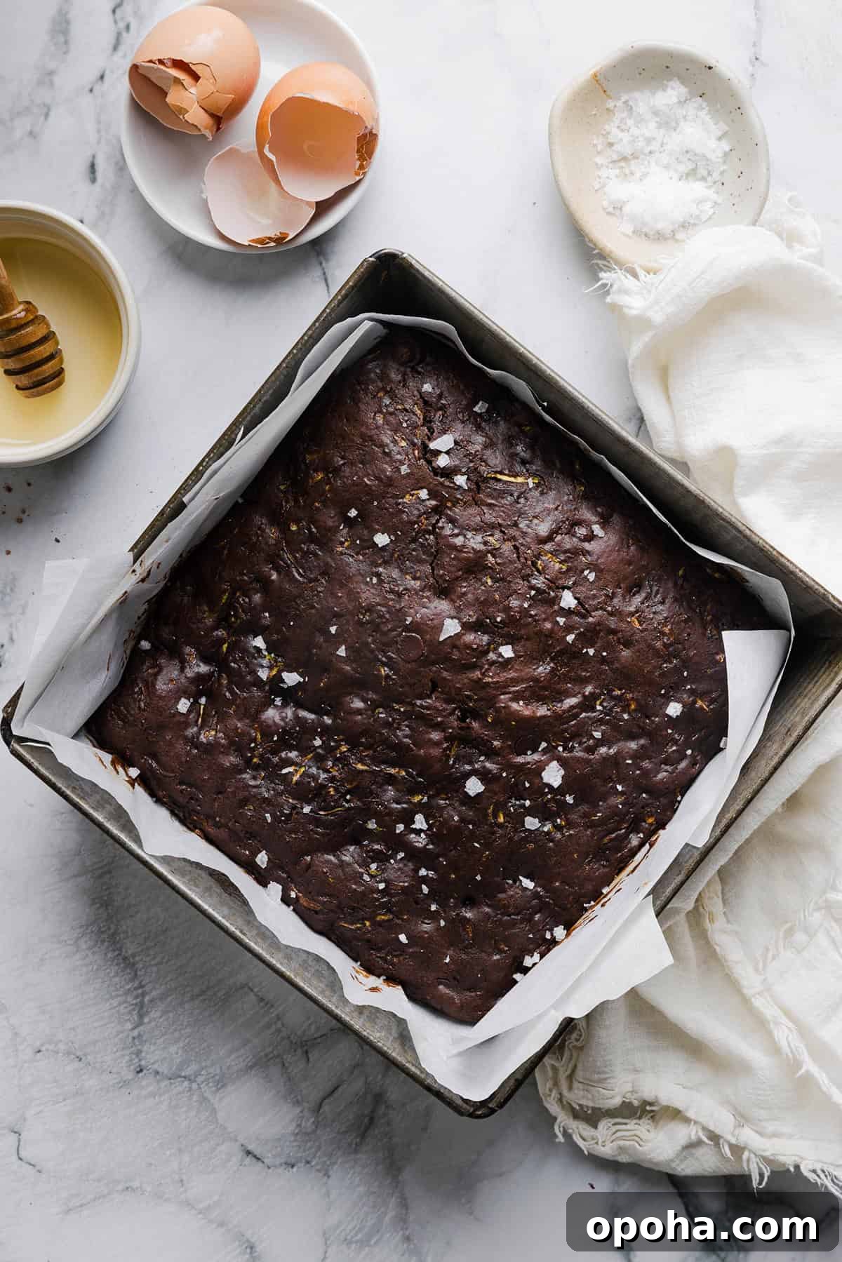 Fudgy Zucchini Brownies Recipe — Moist Chocolate Zucchini Squares 5 These Fudgy Zucchini Brownies are deliciously moist with a rich chocolate taste loaded with shredded zucchini and made healthier with zero butter or refined sugar! One of our family's favorite summer desserts!