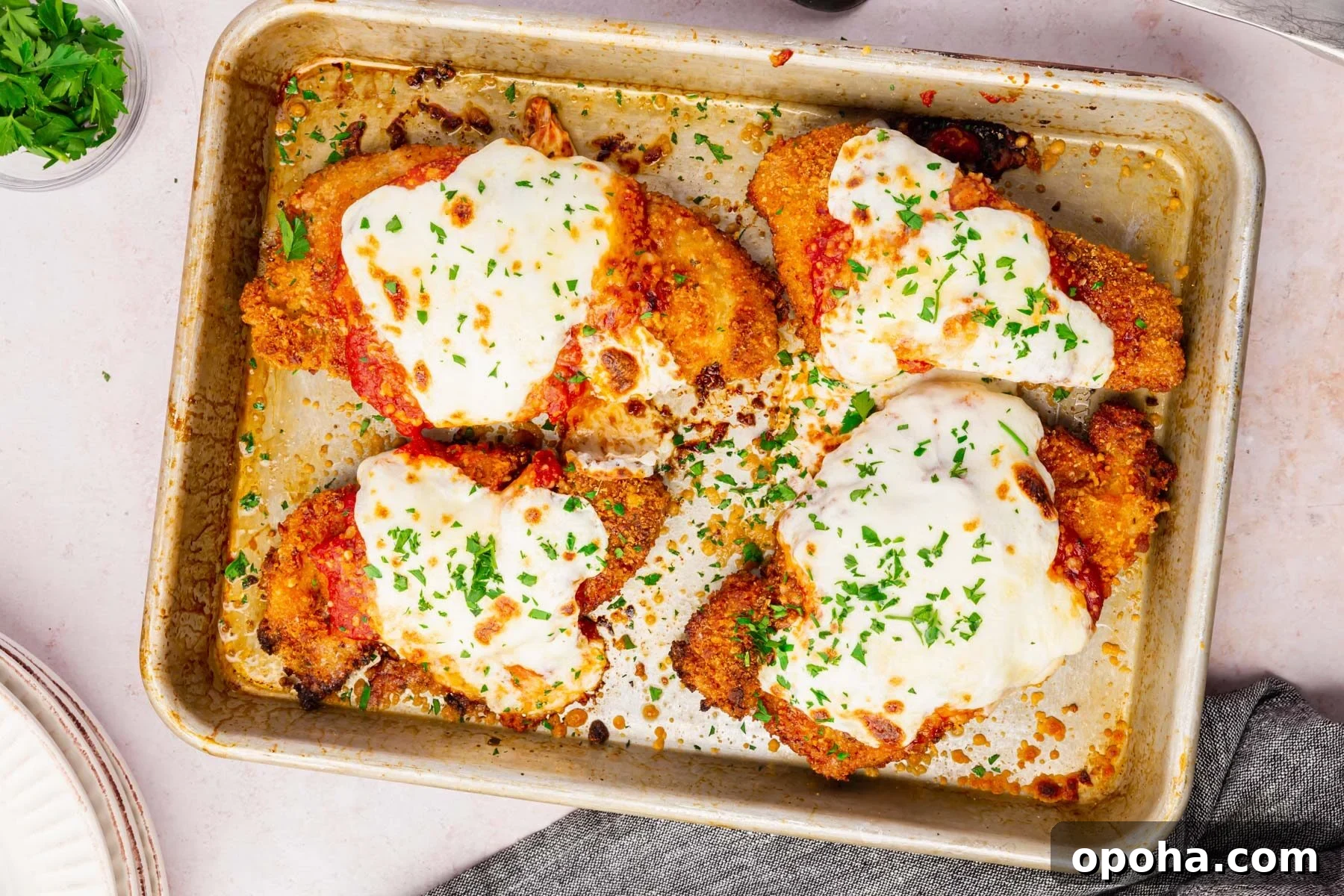 Crispy Gluten-Free Chicken Parmesan Recipe for Dinner 13 A tray full of gluten-free chicken parmesan.