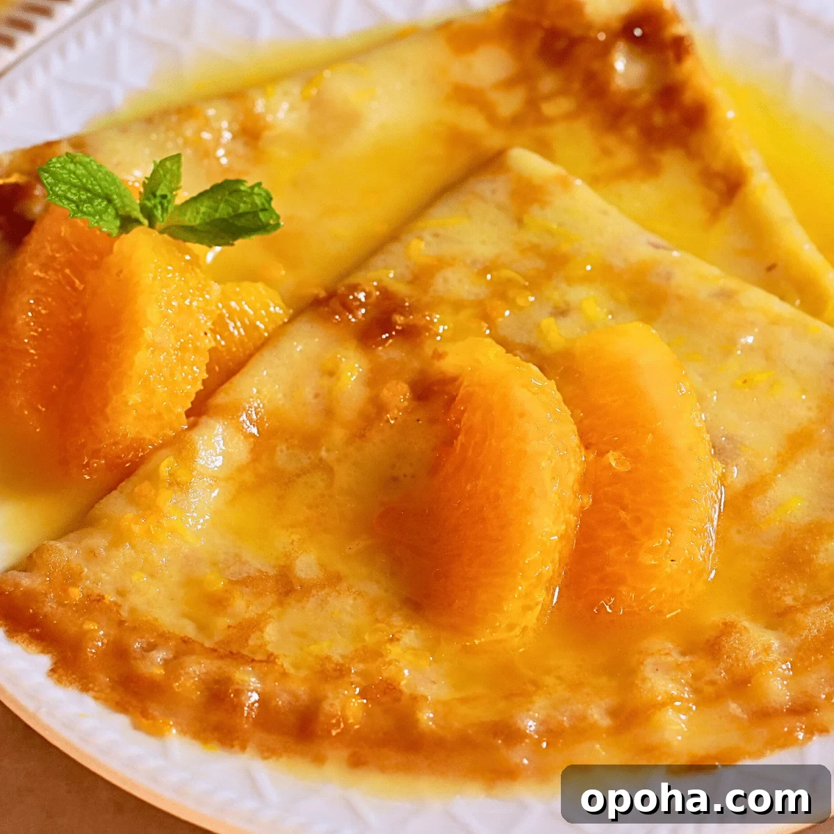 homemade crepes suzette with easy orange butter sauce