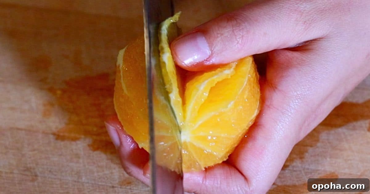 slicing oranges with a knife