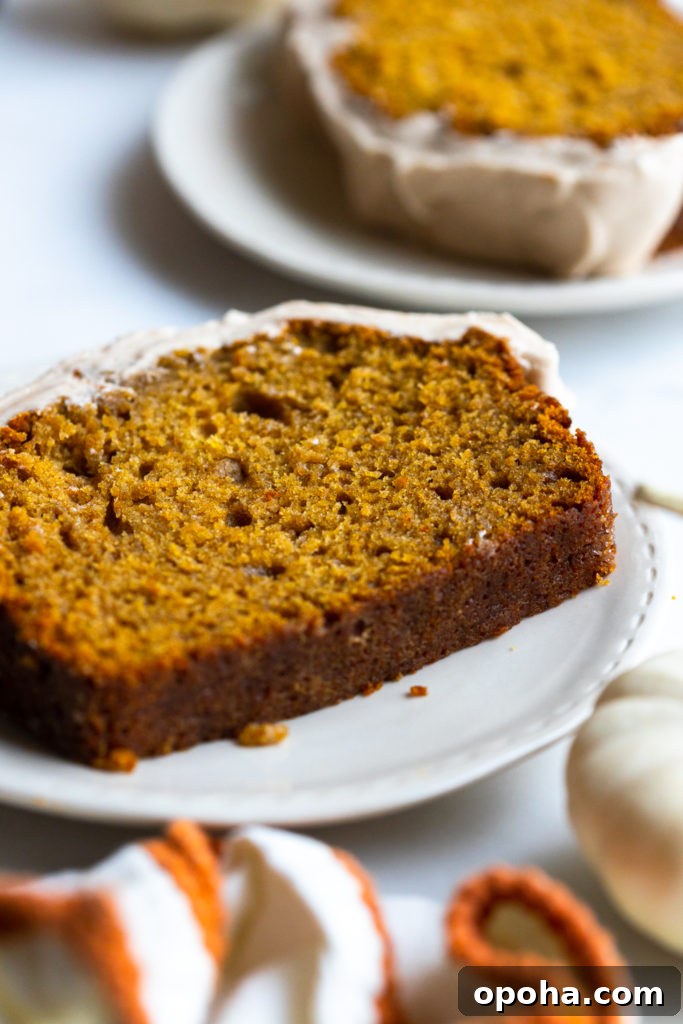 Pumpkin Spice Quick Bread with Maple Cream Cheese Frosting 19 Slice of Pumpkin Spice Bread with Maple Cream Cheese Frosting