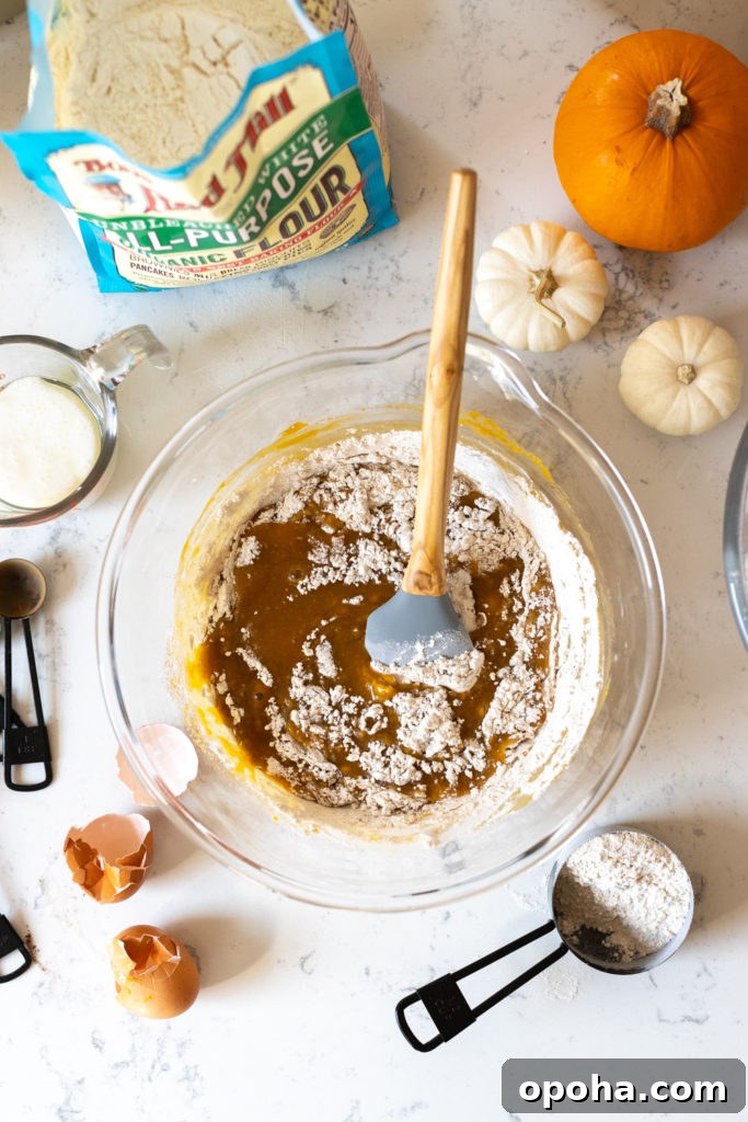 Pumpkin Spice Quick Bread with Maple Cream Cheese Frosting 8 mixing the Pumpkin Spice Bread batter