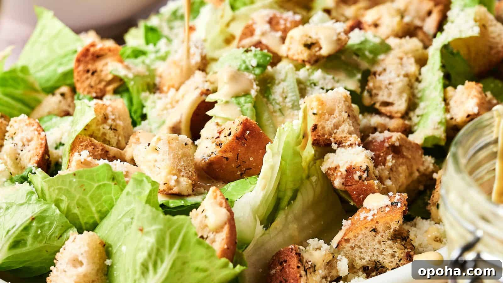 19 Summer Cookout Side Dishes I Make Every Weekend 4 A Caesar salad with romaine lettuce, croutons, grated cheese, and dressing.