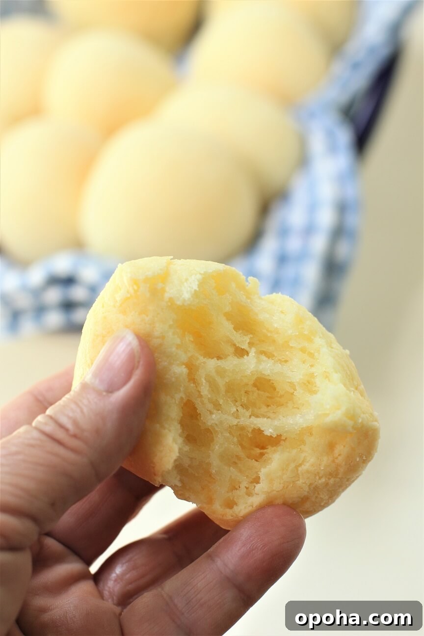 Pan de Yuca: Warm Cheesy Colombian Buns You’ll Love 3 the inside of a cheesy pan de yuca while it's still warm and stretchy