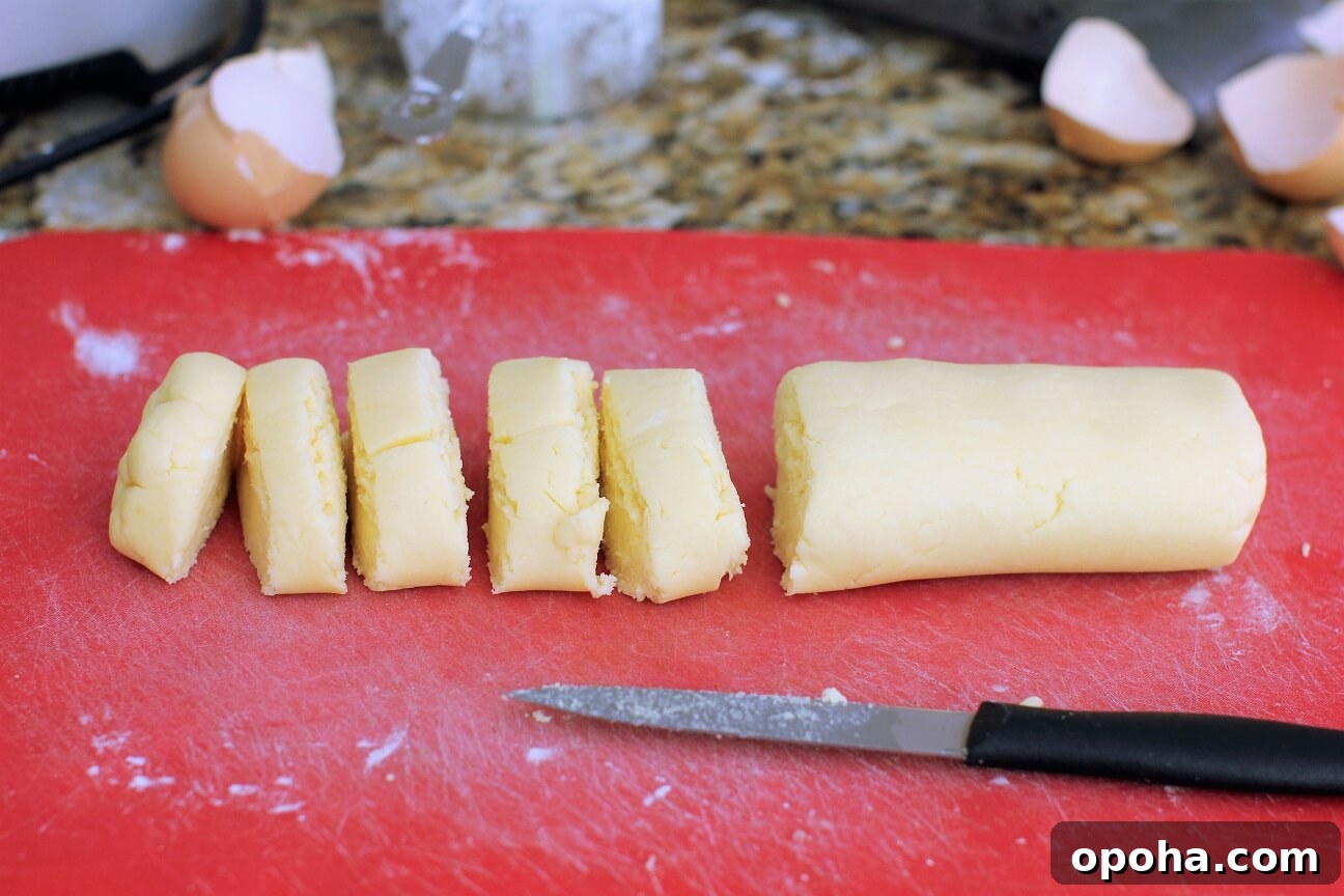 Pan de Yuca: Warm Cheesy Colombian Buns You’ll Love 4 cutting the dough into portions
