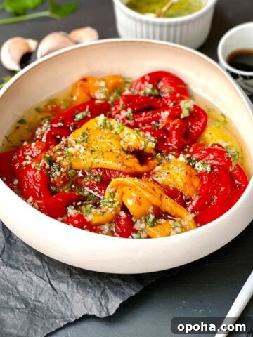 Roasted pepper salad in a plate with salad dressing.
