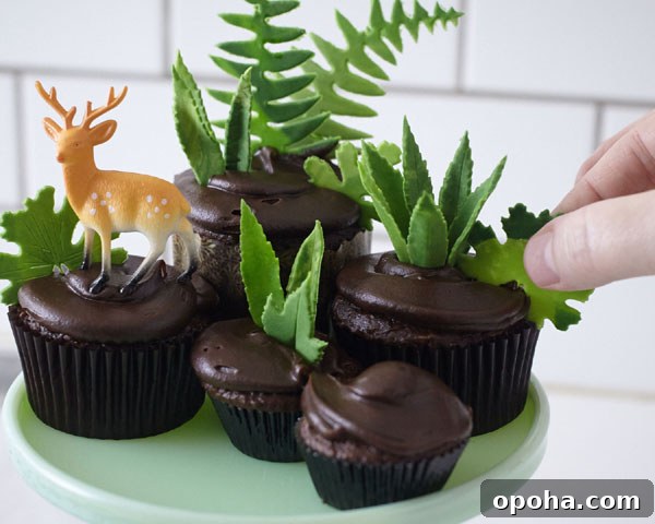 How to Make a Charming Cupcake Terrarium Step-by-Step 13 Adding greenery and deer