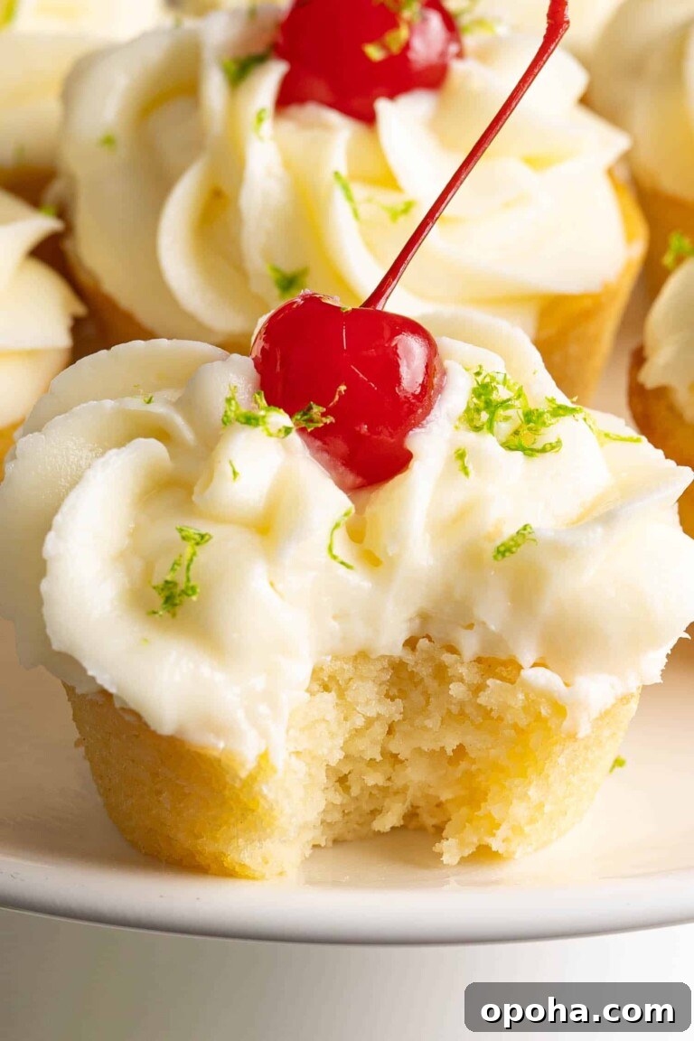a plate of piña colada cupcakes