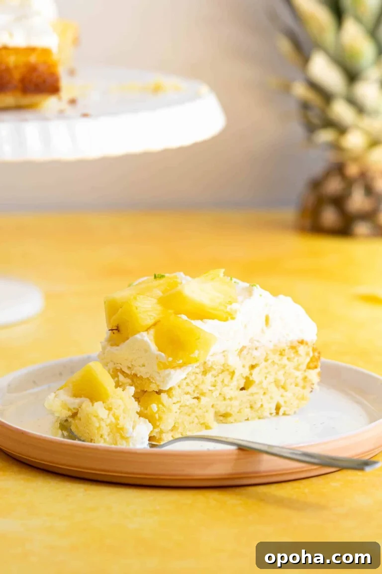 a slice of pina colada cake